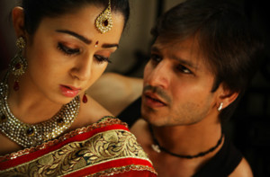 Charmi and Vivek Oberoi in Hot Sexy Scene of the movie Zilla Ghaziabad